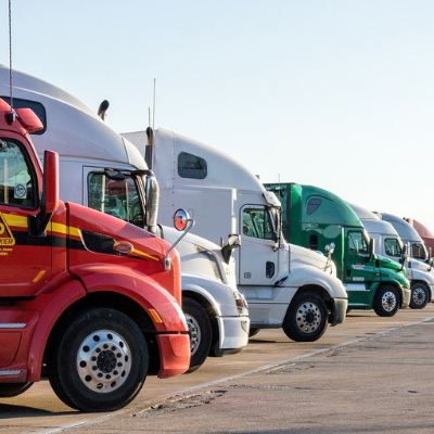 semi truck cabins lined up at truck stop