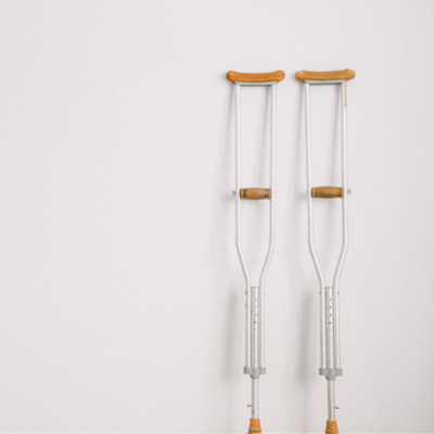 crutches leaning against wall